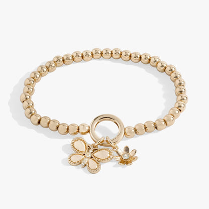 Puffy Butterfly Stretch Bracelet by ALEX AND ANI in gold-tone beads featuring butterfly charms on Tampa Home & Garden Store