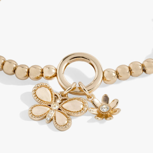 Puffy Butterfly Stretch Bracelet gold-tone beaded design with butterfly charms by Alex Ani on Tampa Home & Garden Store