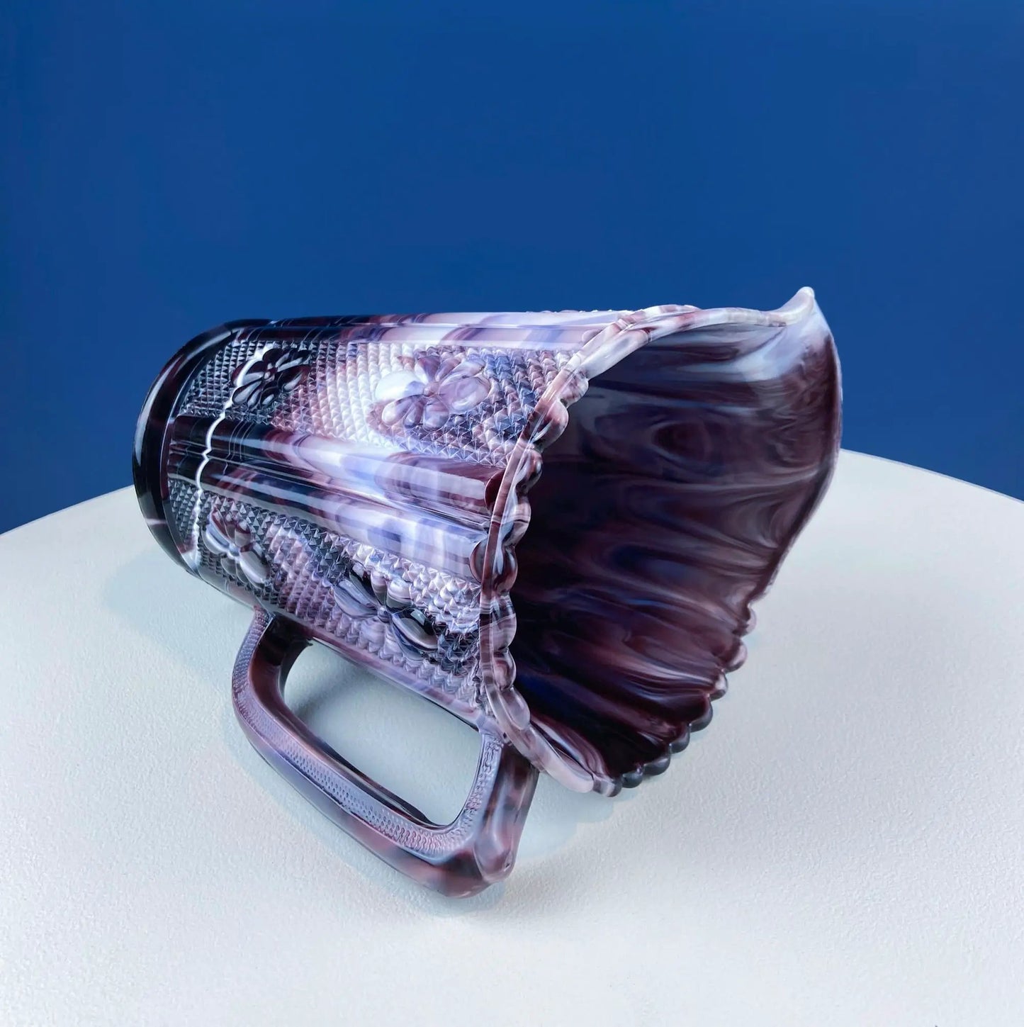 Purple slag glass milk pitcher with geometric motifs and diamond texture on Tampa Home & Garden Store