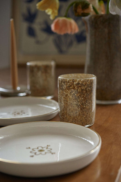 Two hand blown glass tumblers with brown speckled finish by Creating Comfort on Tampa Home & Garden Store