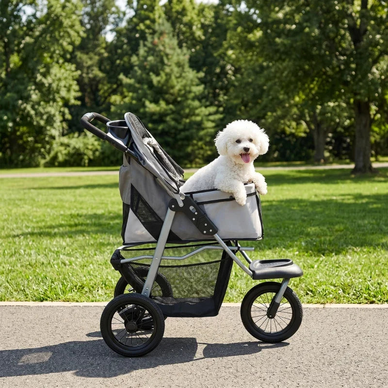Compact All-Terrain Pet Stroller by Furr Baby Gifts; gray three-wheel stroller with dog peeking on Tampa Home & Garden Store