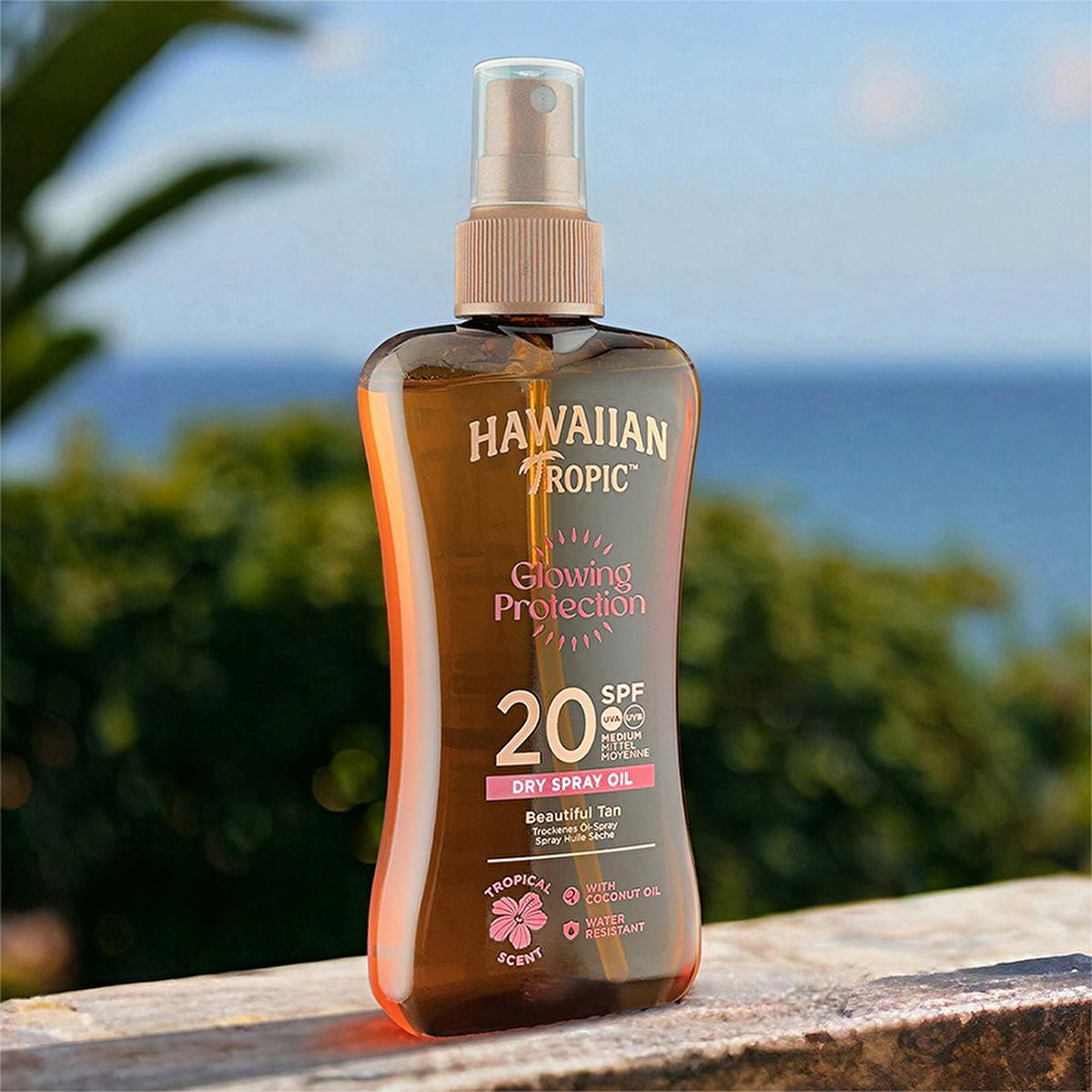 Hawaiian Tropic Glowing Protection SPF20 sunscreen oil bottle, amber plastic, pink label on Tampa Home & Garden Store