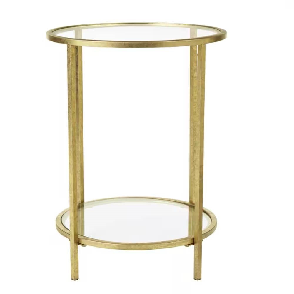 Mesa auxiliar redonda con acento, metal dorado, tapa de cristal, estante inferior.