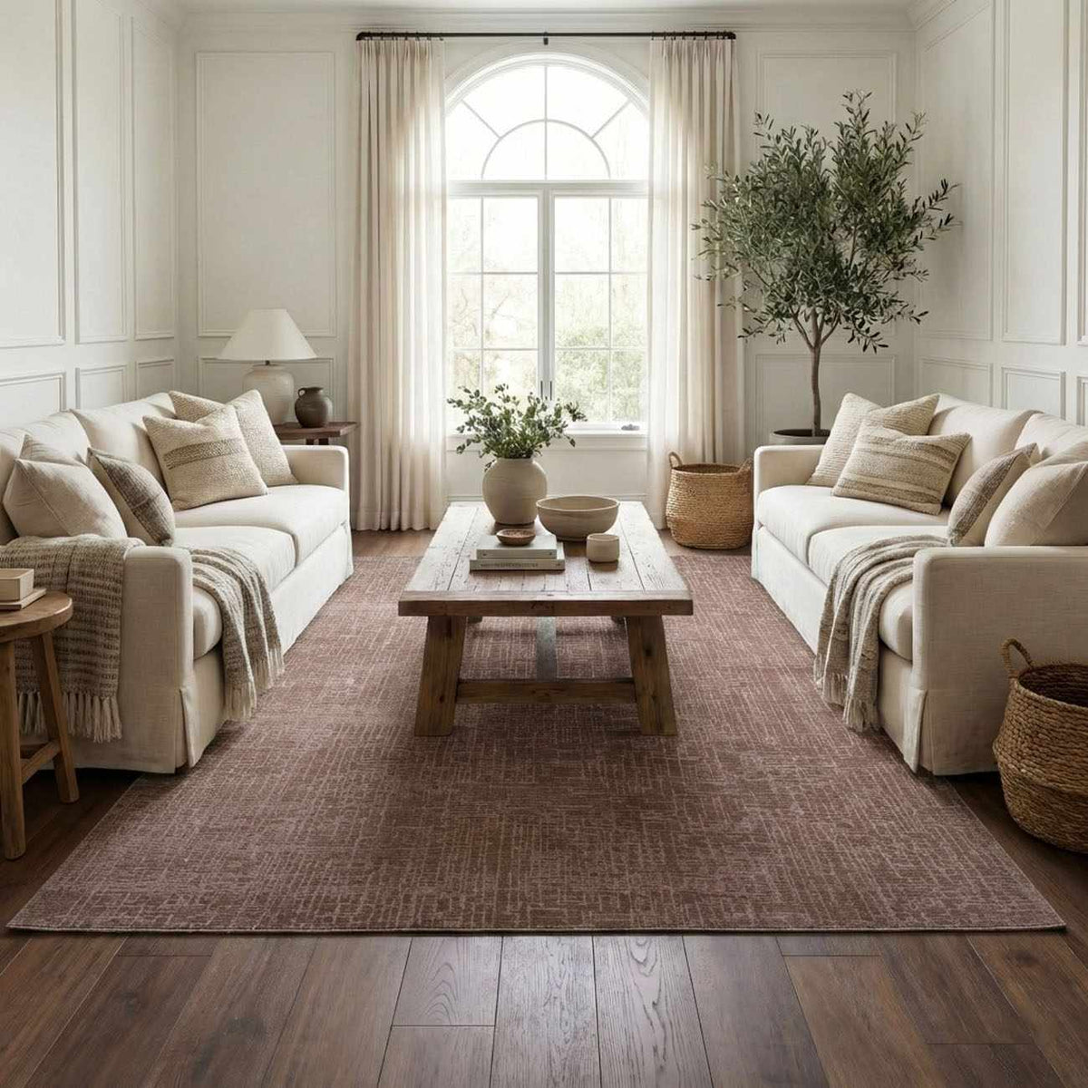 Leanna light brown washable area rug in a neutral living room with beige sofas on Tampa Home & Garden Store