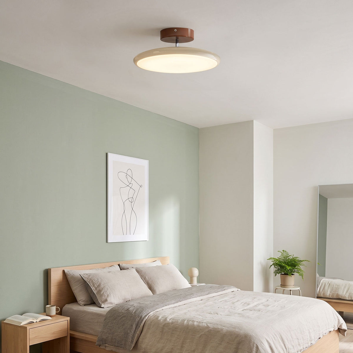 Orbitra flush mount LED ceiling light with swivel arm, beige fixture, dimmable on Tampa Home & Garden Store
