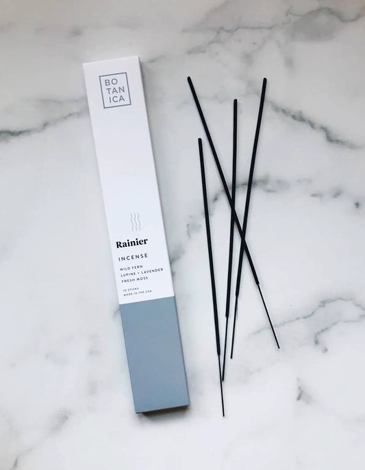 Rainier Incense box with black sticks on marble surface Terra Cotta Botanical Boutique on Tampa Home & Garden Store
