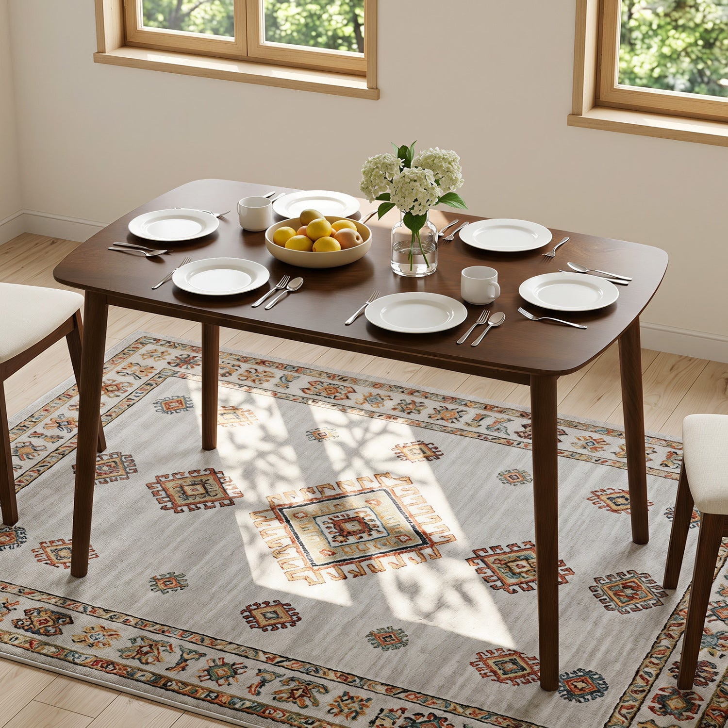 Rectangular dining table for 4 in coffee finish with white dishware and hydrangea centerpiece on Tampa Home & Garden Store