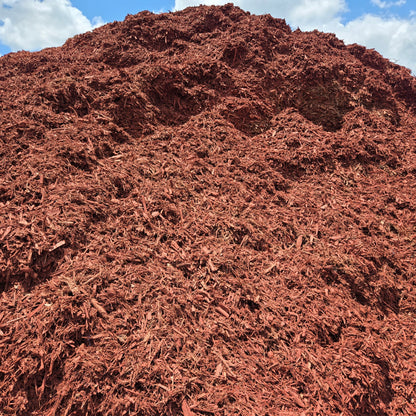 Pile of bulk red mulch for sale delivered.