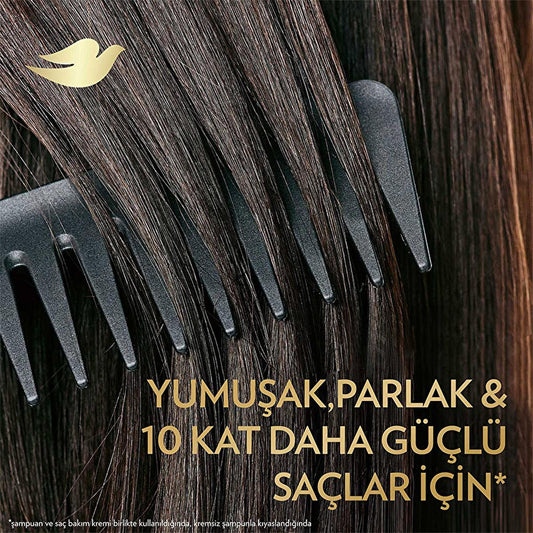 Dove hair repair serum dual-phase formula on dark glossy hair with a black comb on Tampa Home & Garden Store