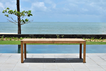 Rinjani rectangular teak dining table in natural finish on seaside patio LifestyleGarden US on Tampa Home & Garden Store