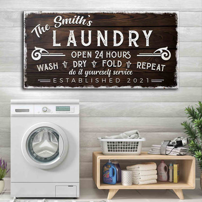 Personalized Laundry Room Sign by Tailored Canvases with white distressed lettering on dark wood on Tampa Home & Garden Store