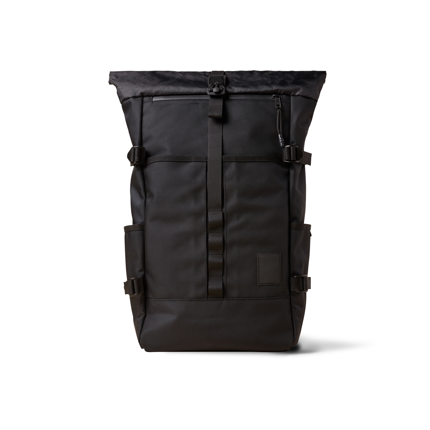 Rolltop backpack by The Brown Buffalo in black rugged fabric with buckle closure on Tampa Home & Garden Store