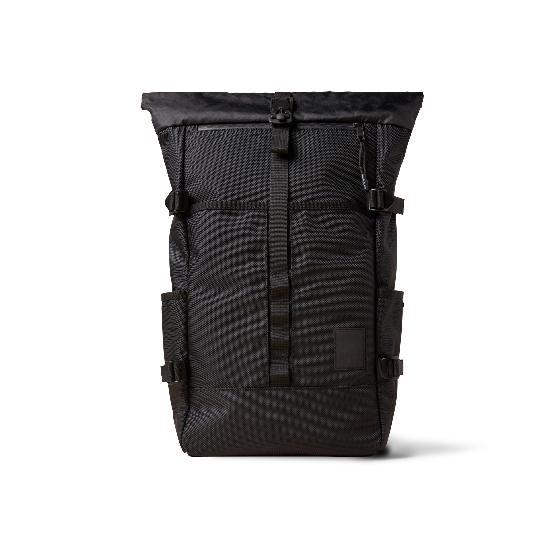 Rolltop backpack by The Brown Buffalo in black rugged fabric with buckle closure on Tampa Home & Garden Store