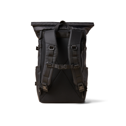 Rolltop backpack by The Brown Buffalo with padded shoulder straps and rugged black fabric on Tampa Home & Garden Store