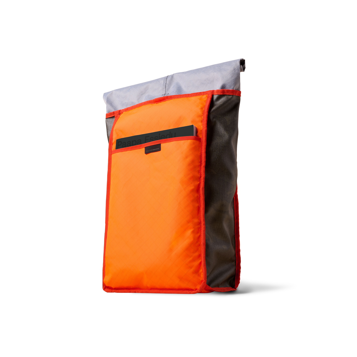 Rolltop backpack The Brown Buffalo with bright orange front pocket, gray top panel, red trim on Tampa Home & Garden Store