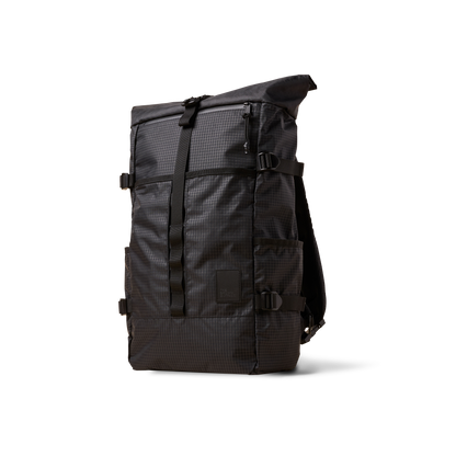 Rolltop backpack The Brown Buffalo in dark gray grid fabric with top closure and web straps on Tampa Home & Garden Store