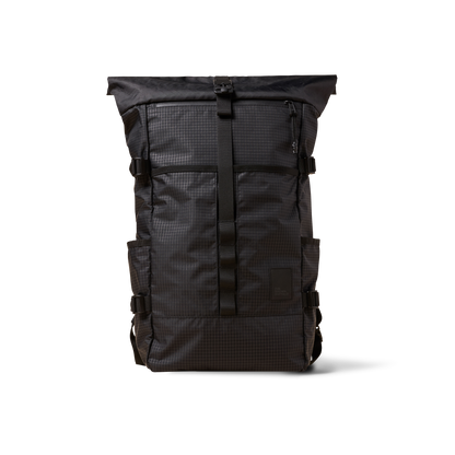 Rolltop backpack The Brown Buffalo in dark gray grid pattern with buckle closure on Tampa Home & Garden Store