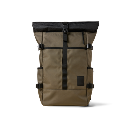 Rolltop backpack by The Brown Buffalo in tan canvas with black rolltop closure and buckle on Tampa Home & Garden Store