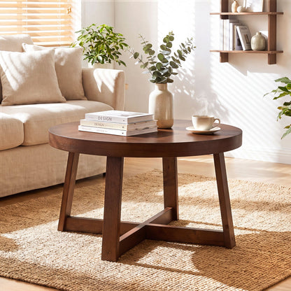 Round coffee table 30 inch with solid wood legs in dark walnut finish in a sunlit living room on Tampa Home & Garden Store