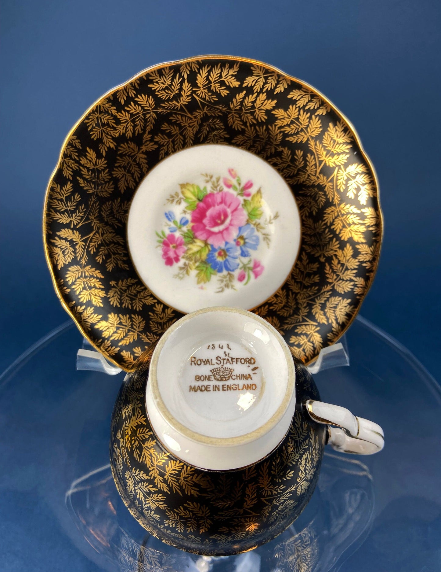 Royal Stafford Cup and Saucer. Black with Gold. Hand Painted Flower Bouquet Inside of Cup and on the Plate. - Tampa Home & Garden Store