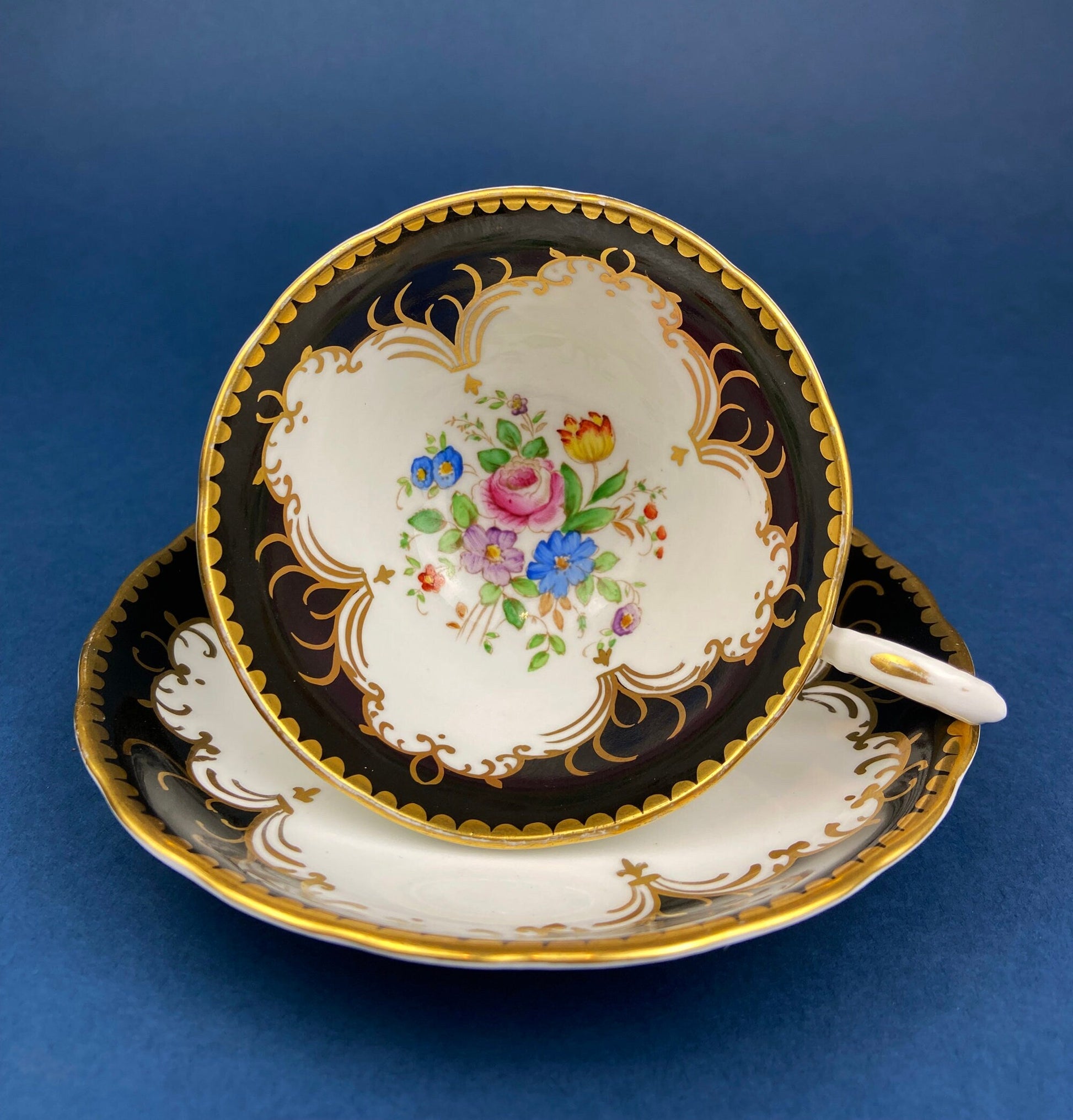 Royal Stafford Cup and Saucer. Black with Gold. Hand Painted Flower Bouquet Inside of Cup and on the Plate. - Tampa Home & Garden Store