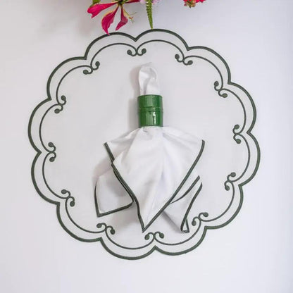White cotton napkin with green trim folded around a bottle, by Talah Home on Tampa Home & Garden Store