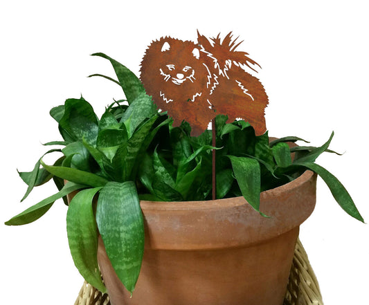 Pomeranian Plant Stake rust-colored metal decor by Rustica Ornamentals in a terracotta pot on Tampa Home & Garden Store