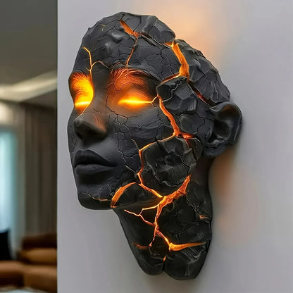 Perfecsy Cracked Soul wall light sculpture in black resin with glowing orange lava veins on Tampa Home & Garden Store