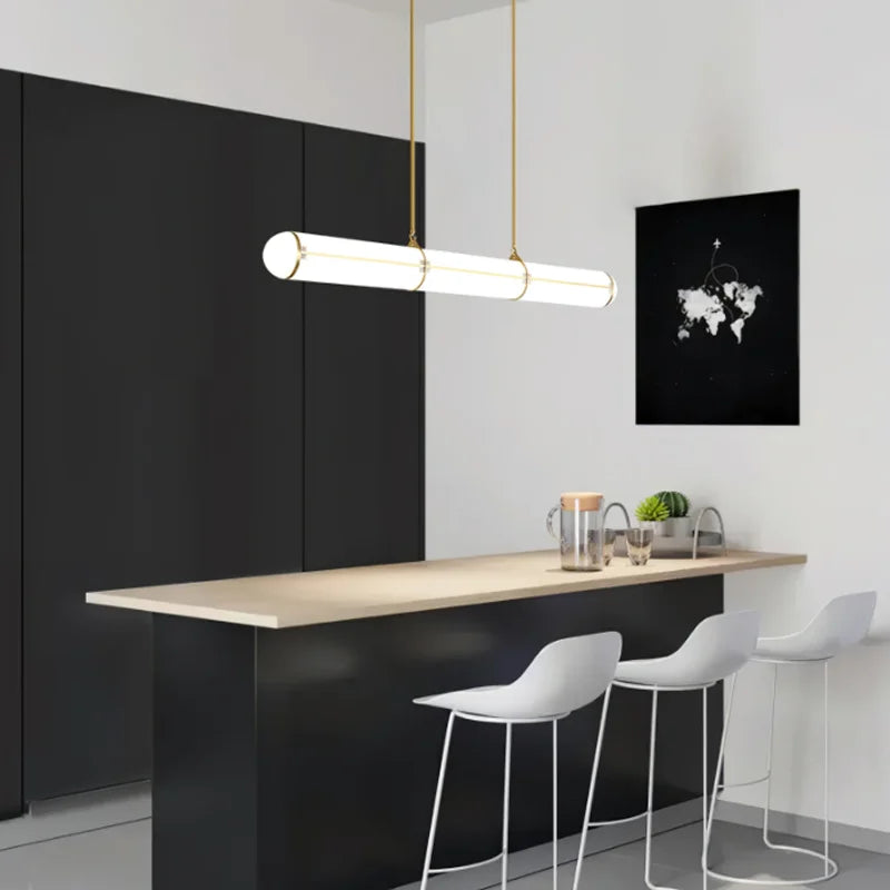 DecorBites Kitchen Island Pendant Light, white fixture with gold accents on a wooden island on Tampa Home & Garden Store