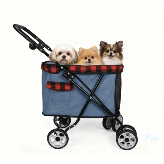 Pet Zen folding pet stroller cabin in blue fabric with red plaid trim carrying 3 small dogs on Tampa Home & Garden Store