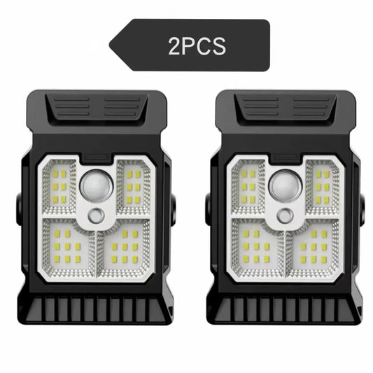 Solar Motion Sensor Clip-On LED Garden Light 2-pack with black housing for landscape pathways on Tampa Home & Garden Store