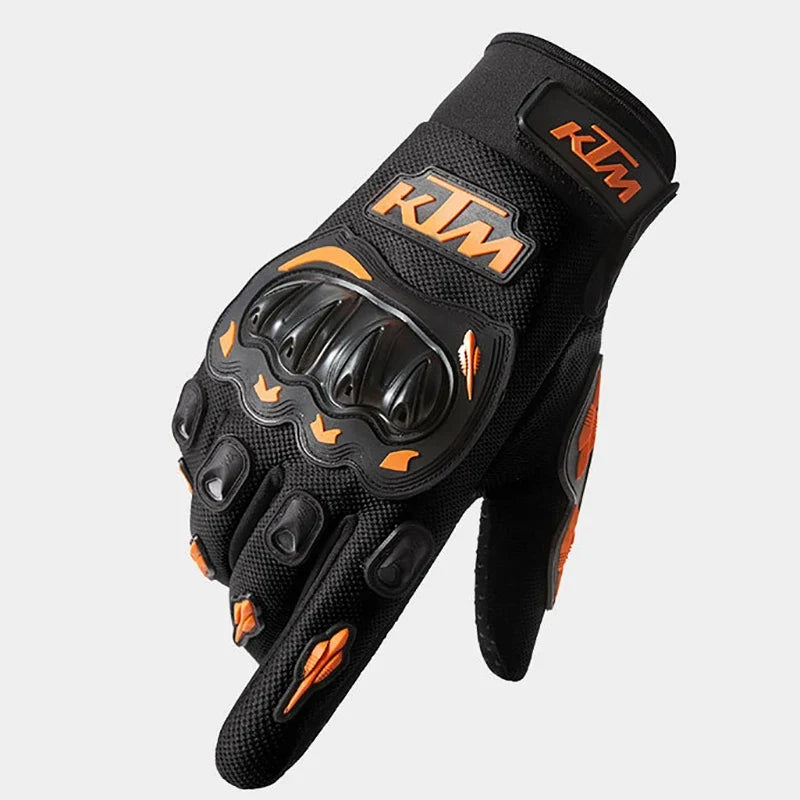 Motorcycle gloves with KTM branding, black with orange knuckle guard padding on Tampa Home & Garden Store