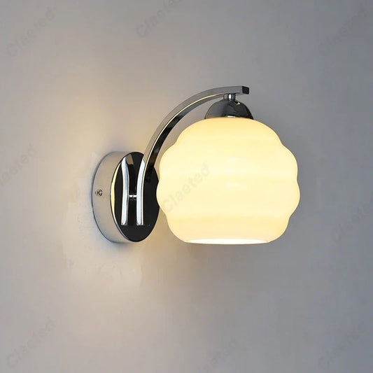 European LED retro glass wall lamp with curved chrome arm and scalloped frosted glass shade on Tampa Home & Garden Store