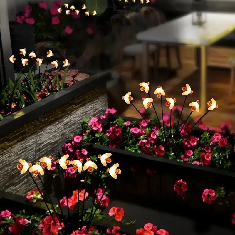Perfecsy Solar 6/8-Head Bee LED Garden Light on black stakes for outdoor landscape lighting on Tampa Home & Garden Store