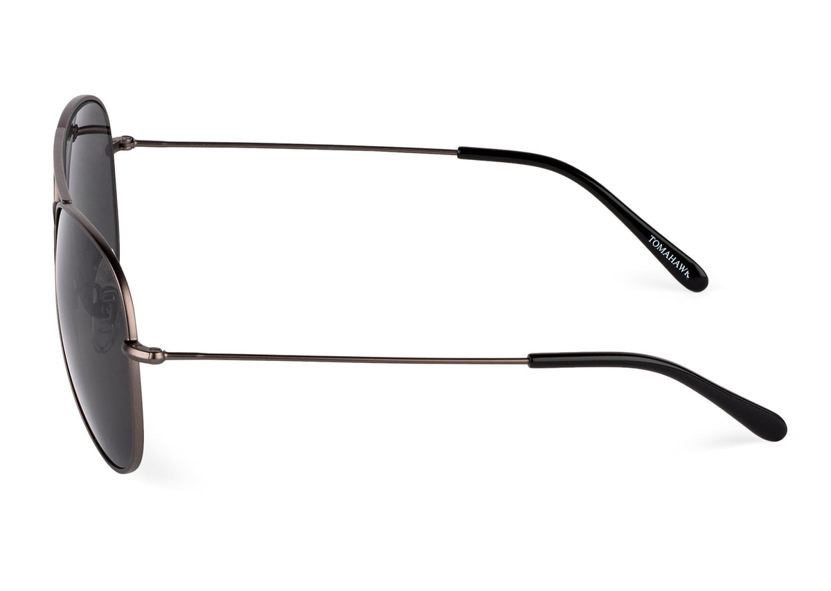 Tomahawk sunglasses by Skeleton Optics, metal frame, black temples, dark lenses on Tampa Home & Garden Store