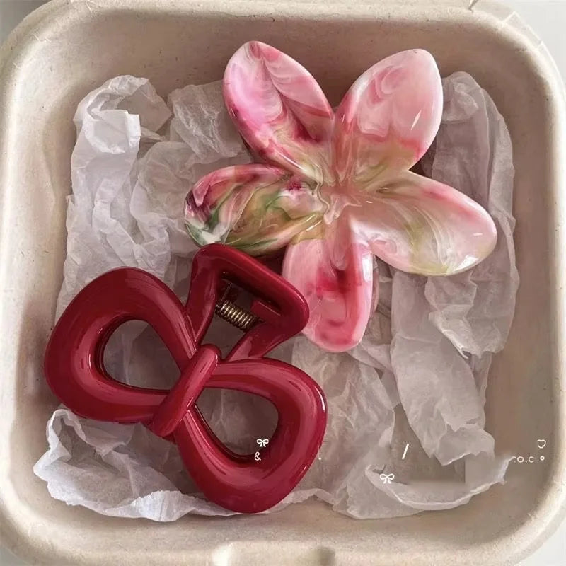 2pc set hair clips: marbled pink flower clip and red heart bow shark-claw hairpin on Tampa Home & Garden Store