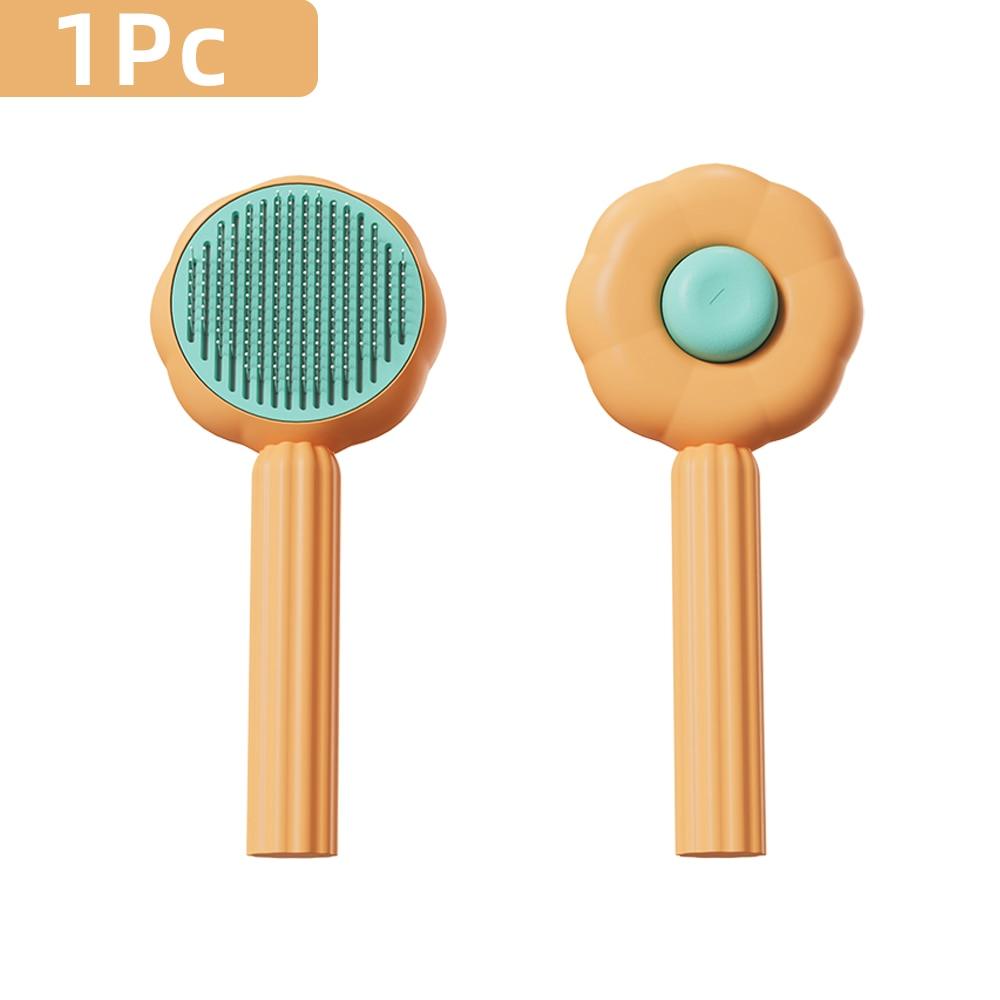 Stevvex cat grooming massage comb with orange handle and teal bristle head on Tampa Home & Garden Store