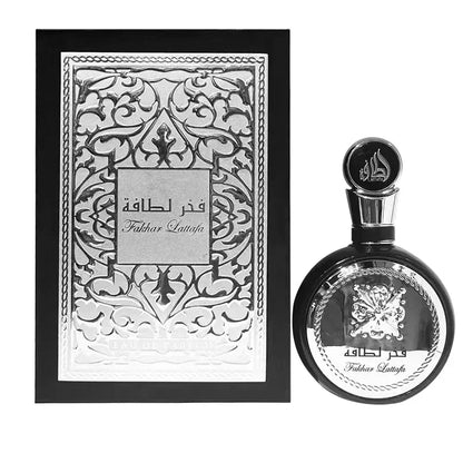 Luxury perfume set with ornate silver-patterned box and black round bottle on Tampa Home & Garden Store