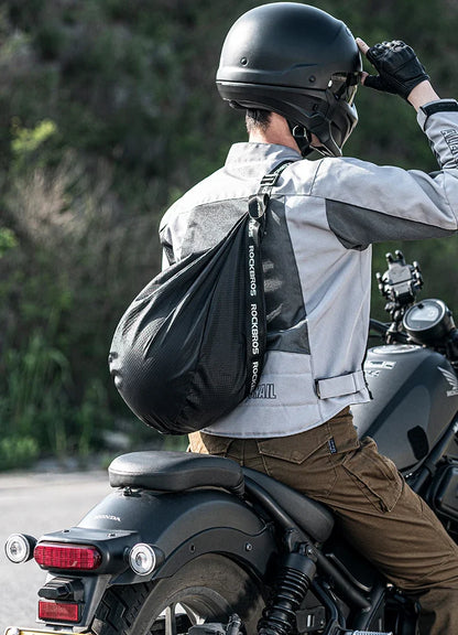 Motorcycle helmet backpack capacity bag black with reflective accents worn by rider ROCKERS on Tampa Home & Garden Store
