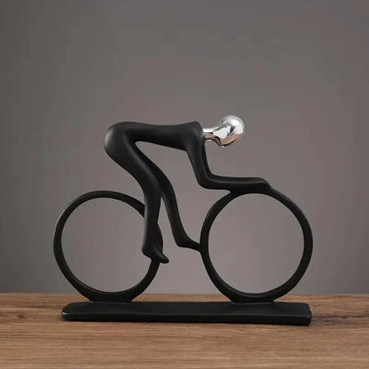 Perfecsy modern abstract resin bicycle rider statue with black cyclist figure on a base on Tampa Home & Garden Store