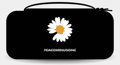 Switch OLED protective storage case by FLIPSTYLEZLLC, black with white daisy and orange center on Tampa Home & Garden Store