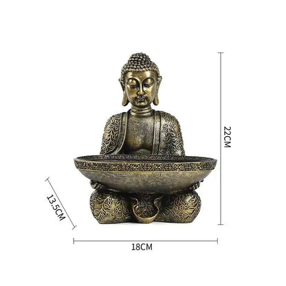 Elephant Buddha statue in resin with bronze finish and floral motif, seated with bowl, 22 cm on Tampa Home & Garden Store