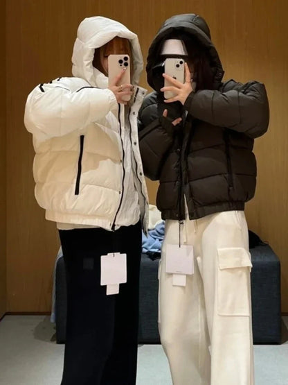 Two women's hooded puffer jackets, white and black, UpTrend Deals thick warm padded coats on Tampa Home & Garden Store
