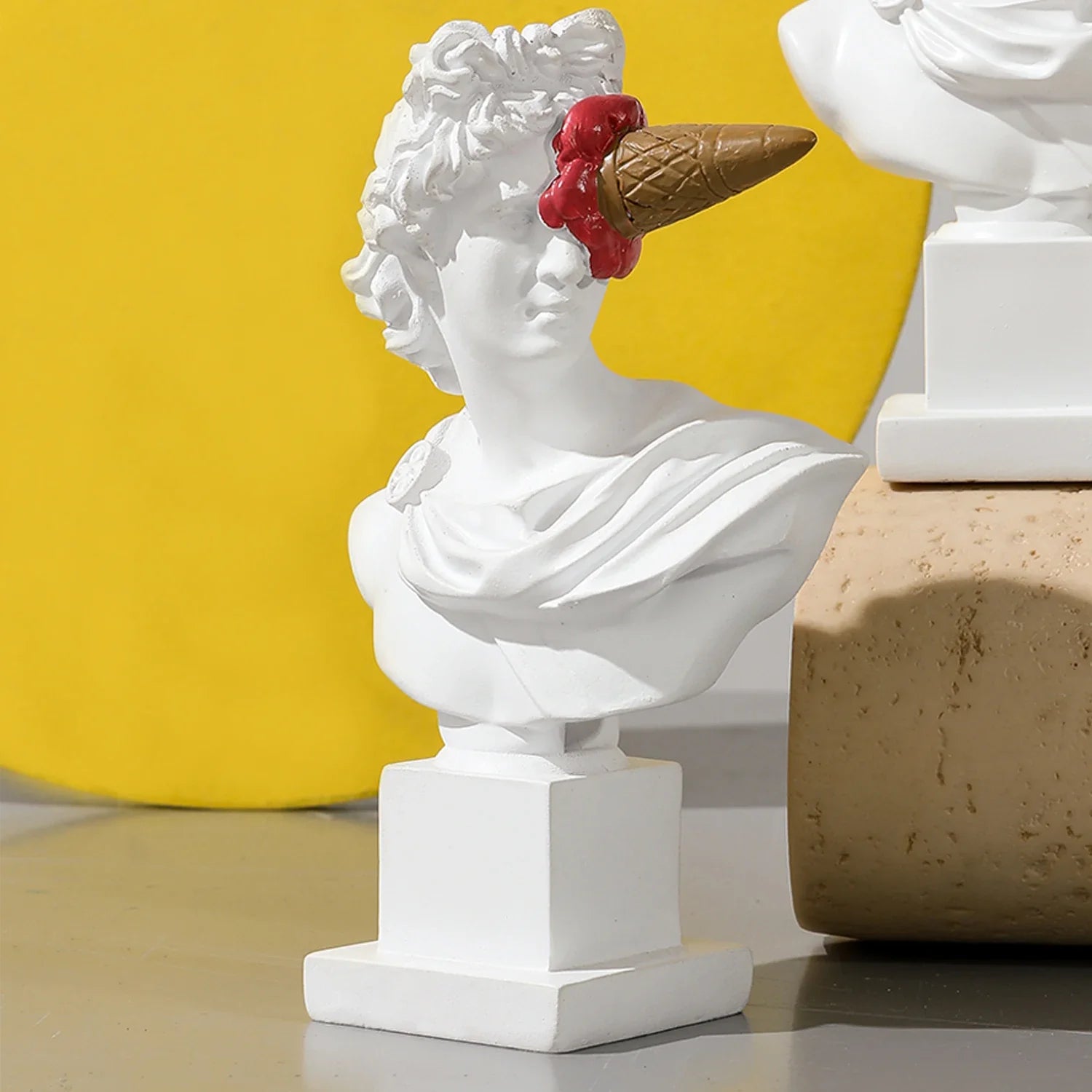 Apollo white resin bust with brown ice cream cone insert and red melt Perfecsy decor on Tampa Home & Garden Store