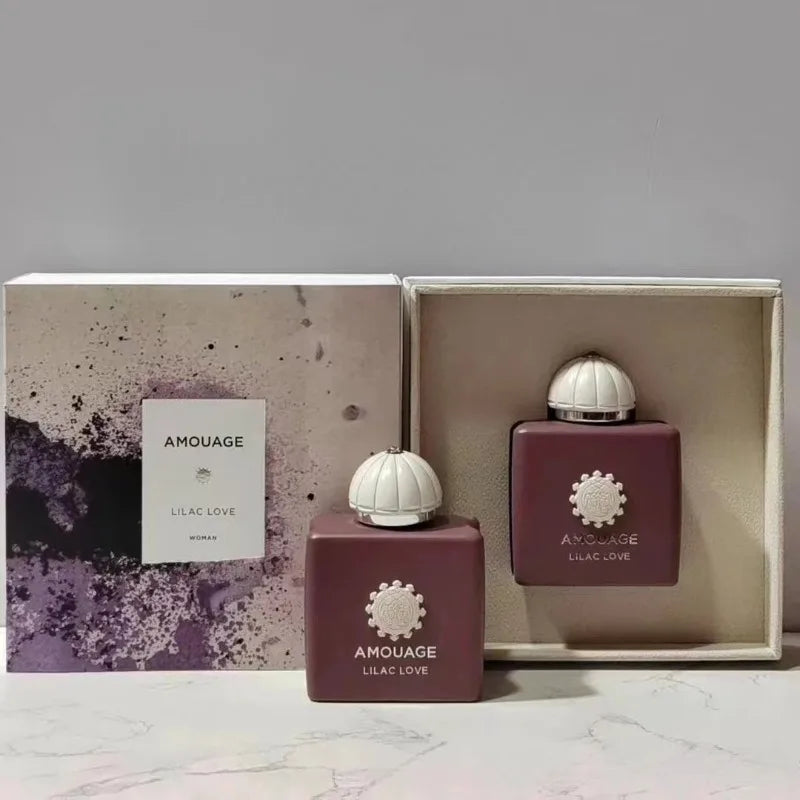 AMOUAGE Lilac Love perfume bottles burgundy glass with white dome caps two in a gift box logo visible on Tampa Home & Garden Store