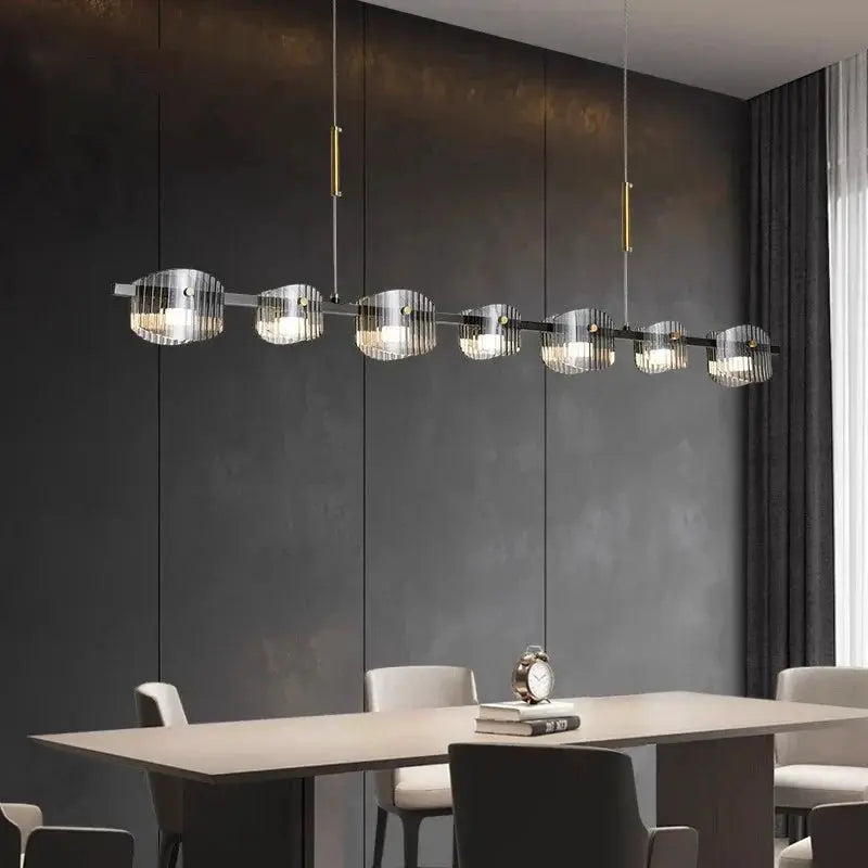 DecorBites LED Pendant Chandelier with glass discs and gold accents over the dining table on Tampa Home & Garden Store