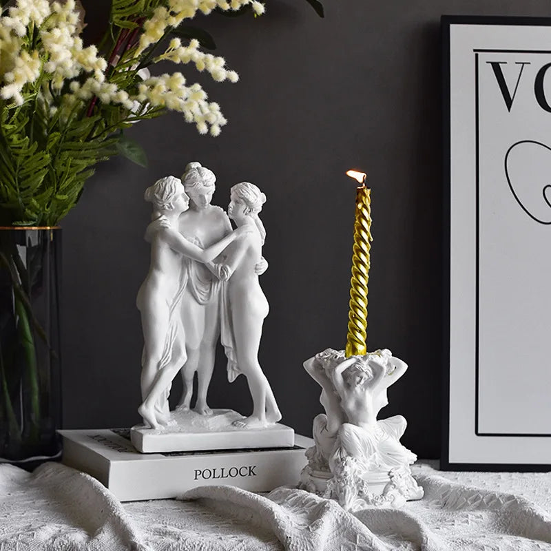 Resin sculpture of three embracing classical female figures, white decorative statue on Tampa Home & Garden Store