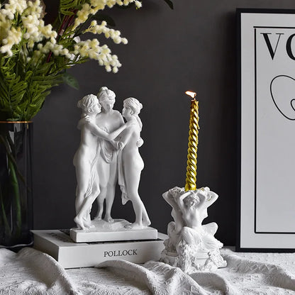 Resin sculpture of three embracing classical female figures, white decorative statue on Tampa Home & Garden Store