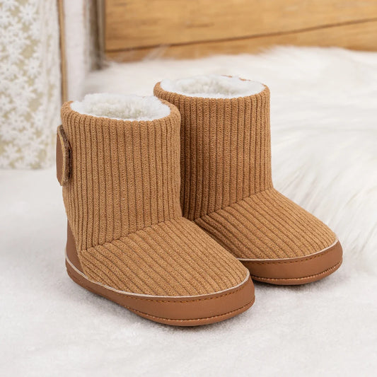 Newborn winter booties in tan corduroy with plush lining, a pair on Tampa Home & Garden Store