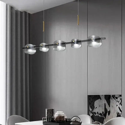 DecorBites 5-light LED pendant chandelier with black rod, gold accents and glass globes on Tampa Home & Garden Store